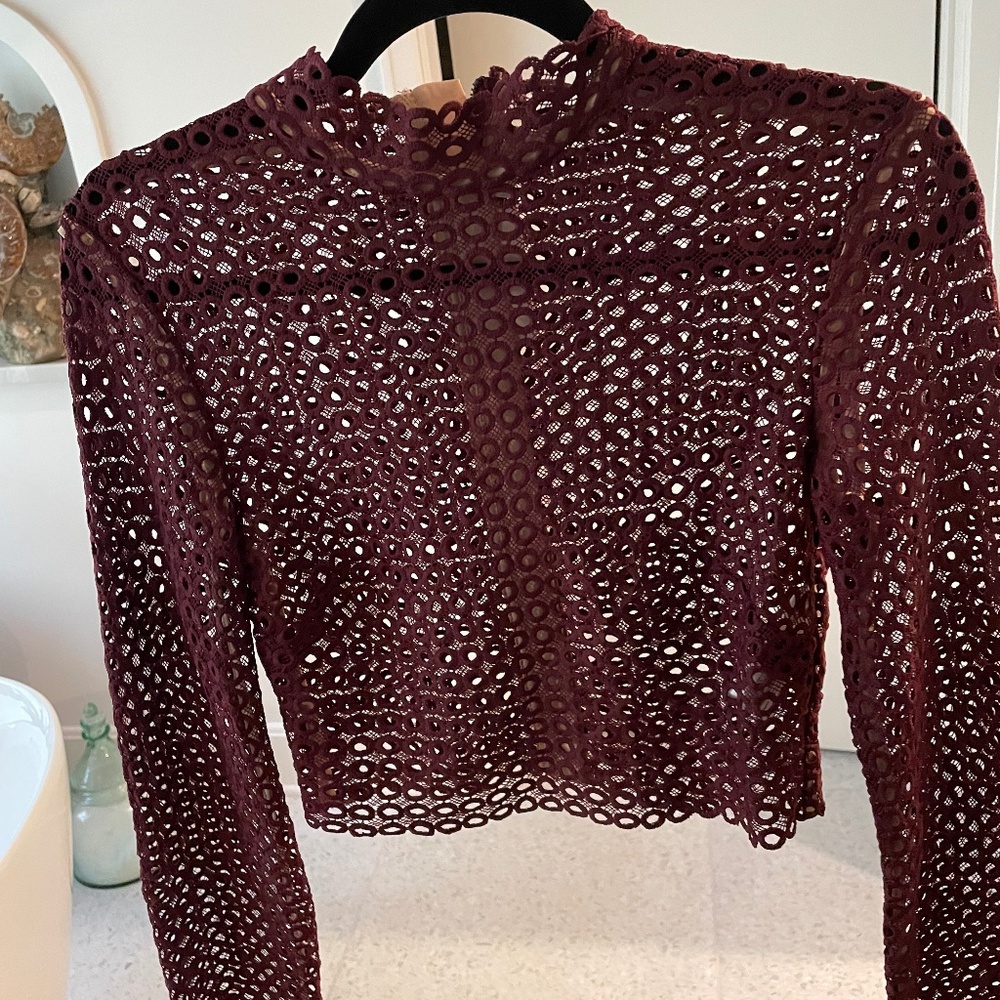 Sheer zip up long sleeved mock turtleneck top